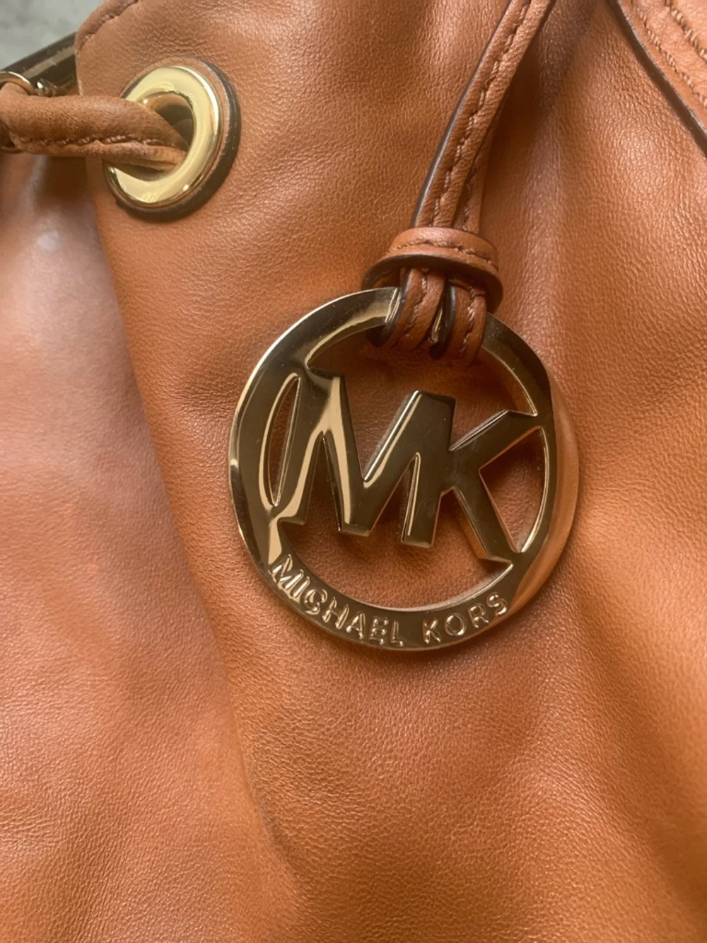 Michael Kors Ludlow Cognac Leather Drawstring Shoulder Bag with Gold Accents - Picture 16 of 16